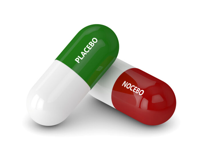 3D render of placebo and nocebo pills over white