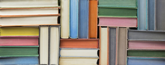 Many old books stacked in texture Lot of old books forming a texture